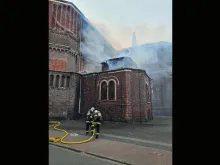 Firefighters respond to the fire at Saint-Pierre-Saint-Paul church, in Lille, France